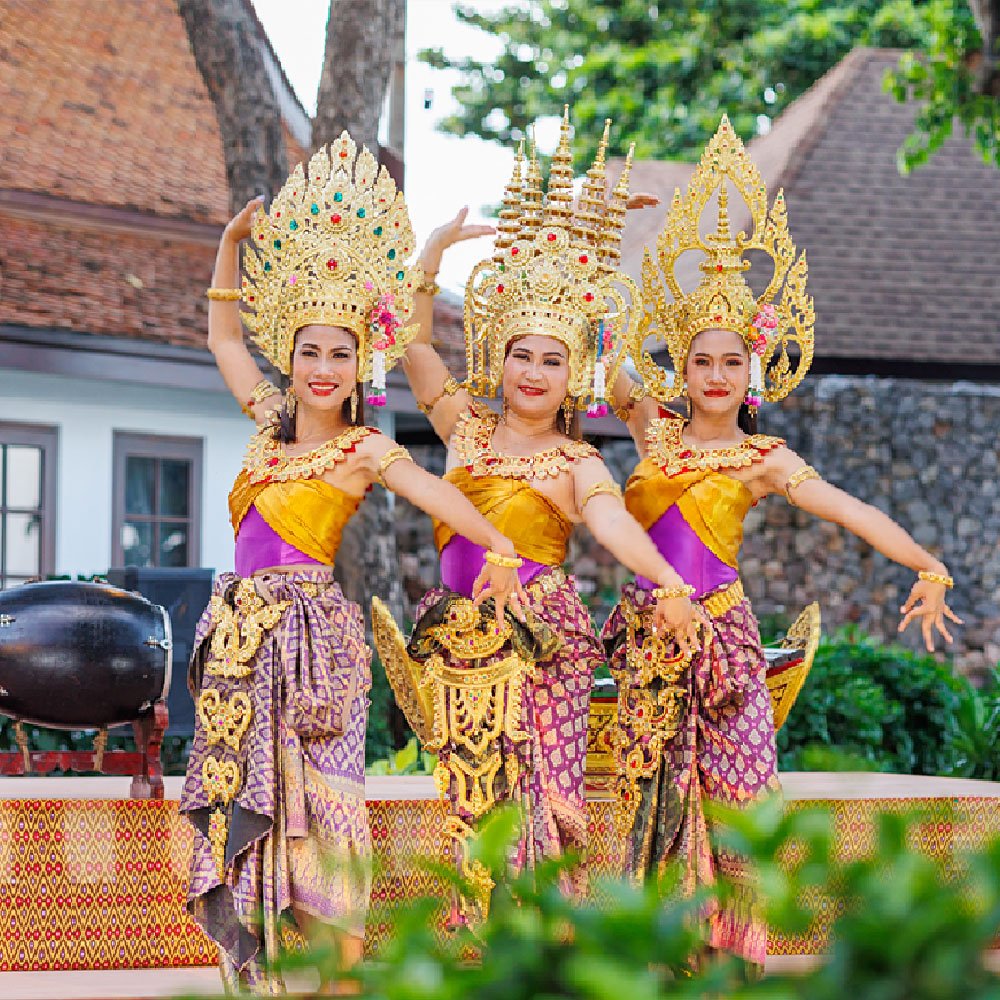 young Thai female dancers dressed in traditional Thai atire